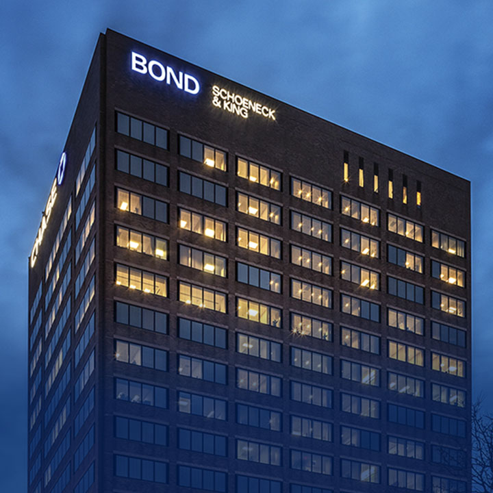 photo of Bond Schoeneck & King building at night